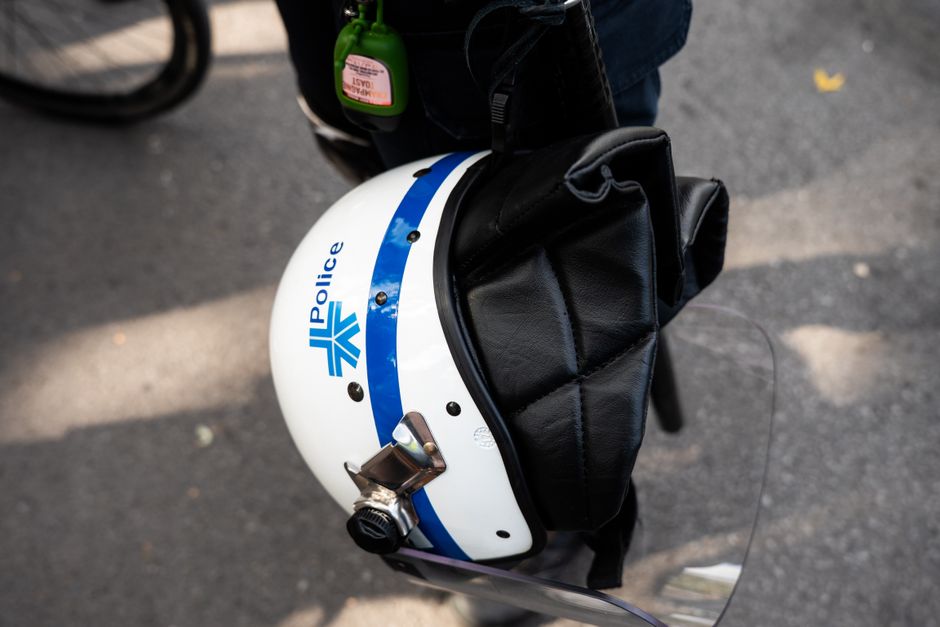 Detailed view of a police helmet with "Police" label, Montréal, Canada.